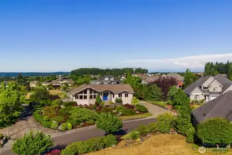 Welcome to McAllister Park—where scenic vistas and luxury living meet. This beautiful home sits proudly on a hilltop lot with commanding views of Mt. Rainier, the Black Hills, and the Olympic Mountains. Surrounded by vibrant landscaping and timeless architecture, it's the kind of neighborhood you’ll never want to leave.