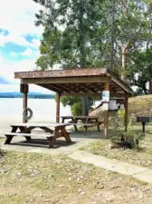 If you're a resident, you can use the BBQ area in the park- this would also be an access point to walk the private beach