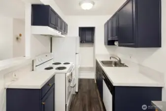 Cute kitchen with pantry.