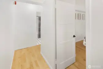 Hallway to bath and bedrooms.