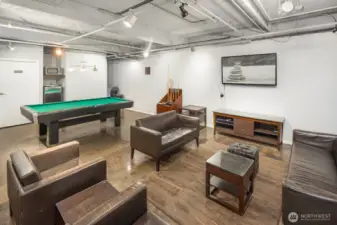 community room with tons of games, TV and Pool table