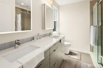 Primary bathroom with ring lighted mirrors
