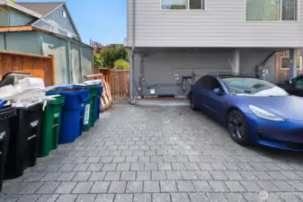 Off-street parking space with conduit for EV charging