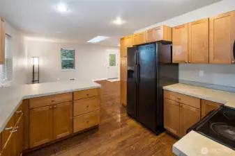 open concept kitchen, dining and living areas