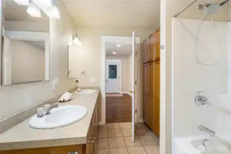 full bath with dual vanity