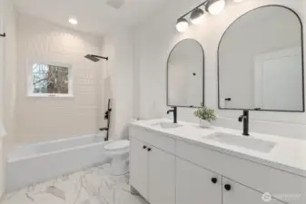 Hall bathroom with double sinks