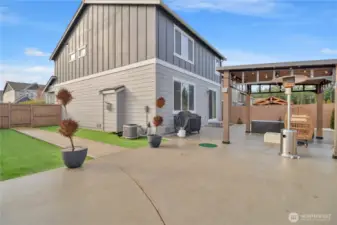 Backyard view three, Astroturf installed for easy pet cleanup and playing, truly no maintenance! Fully-fenced in or course as well.