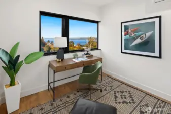 One of the upper level bedrooms is staged as an office space.