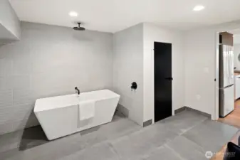 Lower level has a Cold plunge tub and sauna