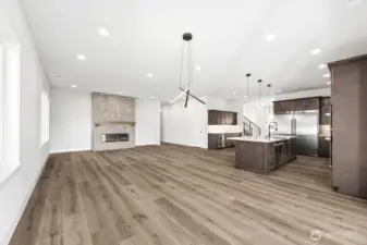 Spacious, open layout with cozy electric, fully tiled fireplace
