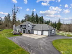 Welcome to Wapiti Estates- 5 acres with custom home.