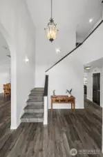 A grand entry welcomes you into the home, setting the tone with an impressive and inviting first impression.