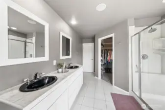 Walk-in closet is organized to keep everyone nice & neat!