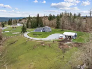 The barn features two stalls with direct access to the pasture, offering convenience and ease for daily care and turnout.