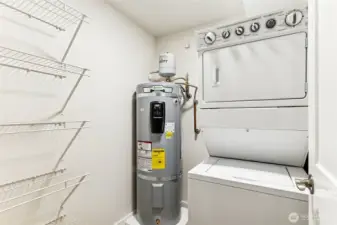 New water heater in spacious laundry room...