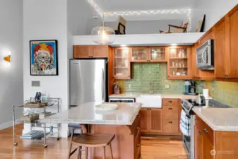 View of kitchen & loft above.