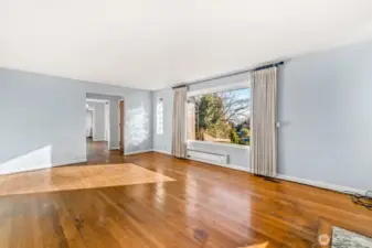 Original oak hardwood floors are throughout the main level (minus kitchen and bath).