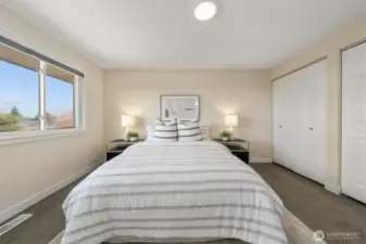 Primary suite with expansive views of Bellevue/Seattle