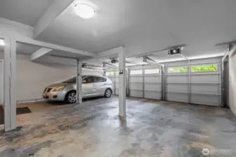 The center space is for Apt 203.  This garage is shared with 2 other homes.  There is also a storage room on this lowest level (ground level).