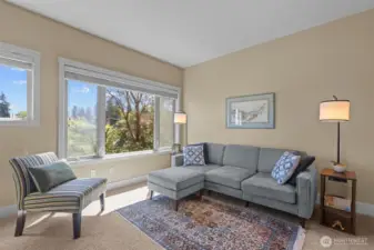 Large east-facing, sun drenched, wood-wrapped windows get ALL the morning sun into the main living space of the home.  On a day like today, the lights are hardly effective.  I love natural light!
