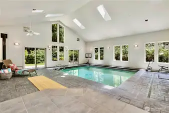 Landing to atrium and pool room!  Features gas fireplace for warming your winter days!