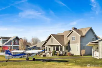 The airport hangar is 54’x32’. The opening for the hangar features a Schweiss Bi-Fold door that is 38’ long and 9’ tall. The other hangar door measures 10’ tall.
