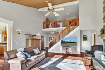 At the top of the balcony is a loft/flex space.