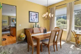 Dining area right off the kitchen, tons of light in here.