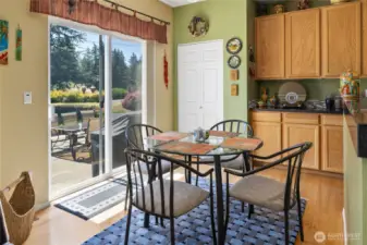 Separate dining area right off the kitchen and access to the backyard oasis out the slider, TONS of storage in this home.