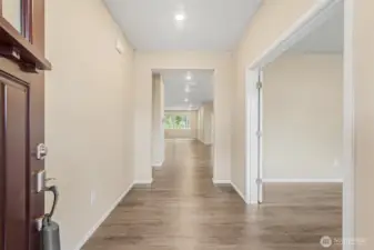 Long entry hall. Office on right.
