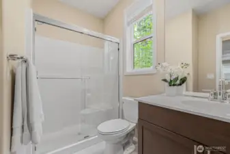 Main floor bath with shower is perfect for guests.