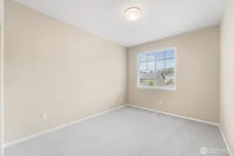 Upstairs bedroom 2 faces the front yard.