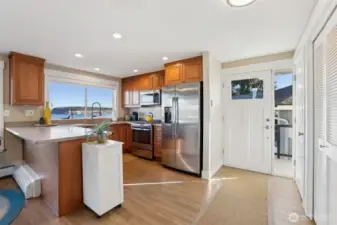 Check who is at the front door through the side-light...this door location makes it easy to unload the groceries
