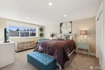 Your primary bedroom can comfortably accommodate king-sized furniture