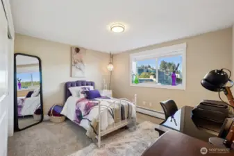 Natural light floods the room. OR shut the white wide blinds for privacy.