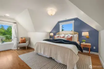 Primary bedroom, large enough for a king bed. Views of Mt. Rainier from this window on a clear day.