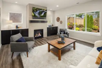 The current owner had dual built in storage cabinets installed flanking the gas fireplace.  An electric blower was another upgrade added to the fireplace. The flat screen tv and sound bar do not convey, but are negotiable.