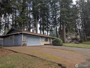 Corner lot home with plenty of parking.