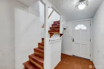 Stairs from upper floor to basement.