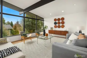 Sleek window shades run the expanse of the larger lower windows, keeping the late afternoon sun at bay when needed.  Central A/C kicks things down a notch on really toasty days.