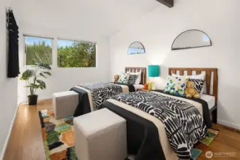 The 3rd main-floor bedroom is even larger than the last.  Think bunk-beds + dressers + play +......