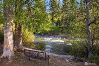 Zen bench at river's edge