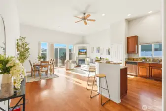 Vaulted ceilings and expansive windows create a bright, open atmosphere.