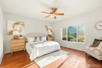 Spacious primary suite provides a peaceful retreat at the end of the day.