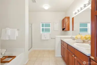 Ensuite bath features a soaking tub for ultimate relaxation.