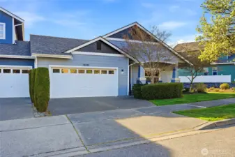Spacious two-car garage provides parking and extra storage.