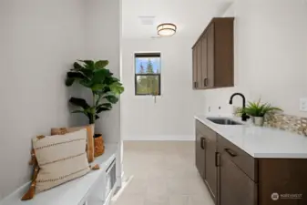 Laundry/Mud Room adjacent to the Kitchen.