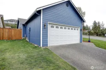 The gate to the backyard is on the North side of the home.