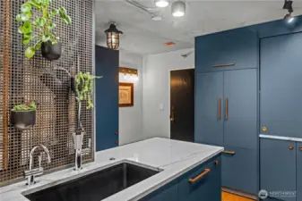 Entry with custom mudroom bench and coat closet