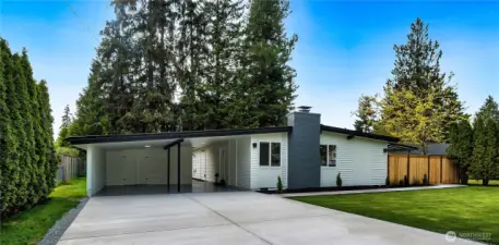 Fresh new exterior paint, concrete and landscaping